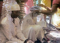 Bride and groom are blessed at a Hindu wedding ceremony, Guyana