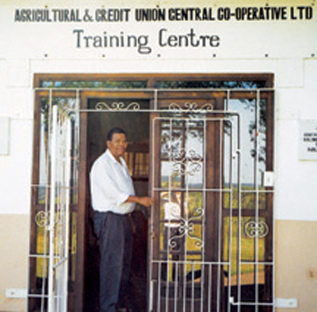 Bishop Mansuete Biyase of Eshowe Diocese, South Africa, in front of the credit union.