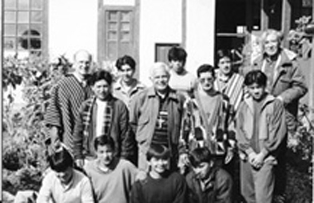 (CREDIT Eric Lagacé) Eric Lagacé and children in Riobamba wear masks for protection from the volcanic ash of Mother Tungurahua.