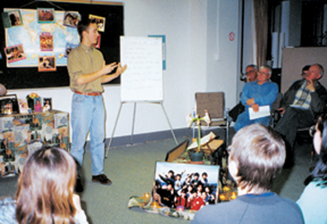 Craig addresses the group at Scarboro Missions