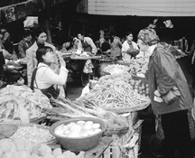 (CREDIT: Beverley Vantomme) China missioner Mary Lou Hoawrd at the market near her apartment.