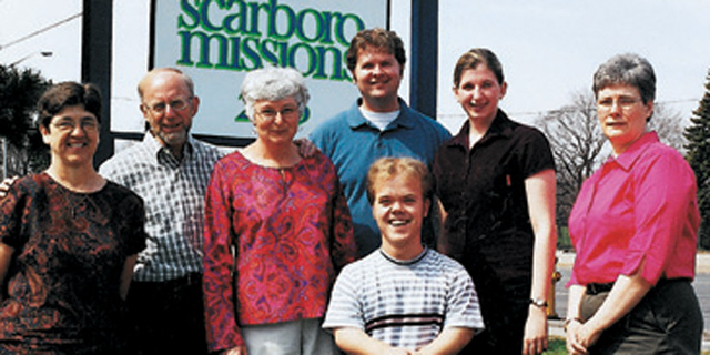 (CREDIT Michael Traher, S.F.M.) L-R: Fernande Barnabé, m.o.; Peter and Magda vanZyl; Marc Chartrand and Anne Quesnelle; Dorothy Novak; and in front, Scott McDonald.