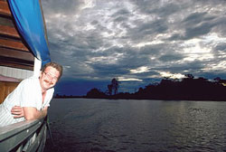 Scarboro missioner Fr. Ron MacDonell travelling on the Amazon River. Fr. Ron first went to Brazil in 1986. He does pastoral work among indigenous peoples and through his linguistic training is helping them to preserve their language and culture.