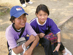 Hill tribe children at the Camillian Social Center in Chiang Rai, Thailand, work on the needlework that is their tradition. Credit: Susan Keays