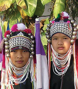 It is customary for hill tribe people to wear tribal clothing whenever they venture outside their village. Credit: Susan Keays