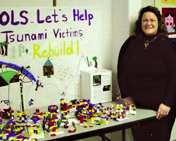 Teacher Lynette Brossart displays a Lego village built by students at Our Lady of the Snows Catholic Academy in Canmore, Alberta. 