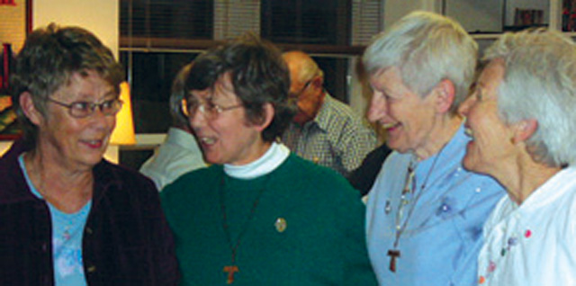 Scarboro lay missionaries Mary Olenick (left) and Kate O’Donnell (far right) at a Scarboro community gathering. 