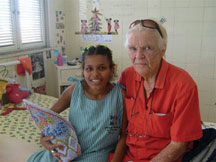  Sr. Mona Kelly visits Genaina in the hospital. Fortaleza, Brazil.