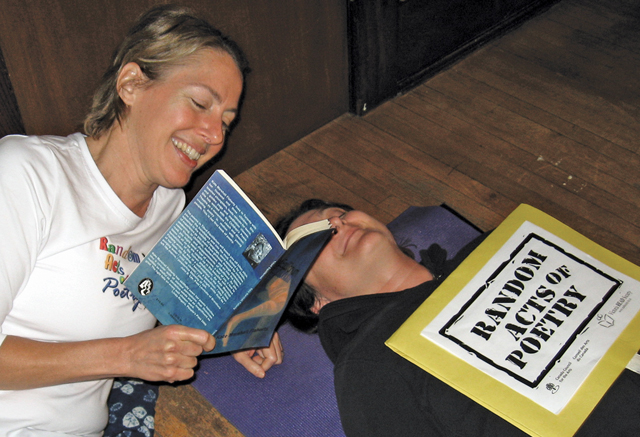 Kate Flaherty reading poetry at a student retreat