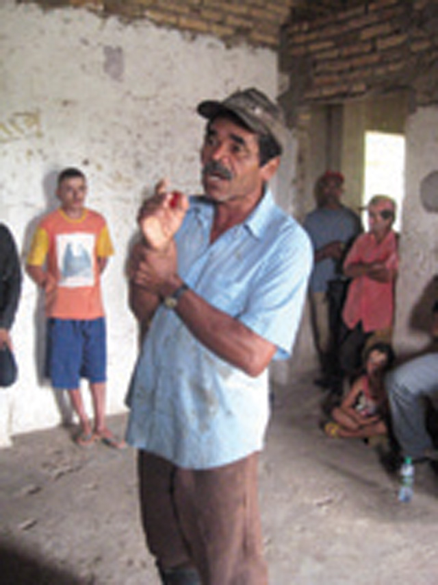 João da Silva, a member of the Fazenda Jabuticaba landless community, became emotional while speaking of their efforts to gain land.