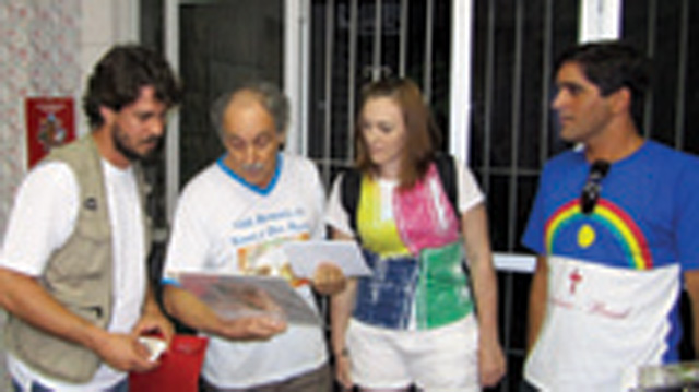 After our meeting, Kerrianne presents a gift to Fr. Herminio Canova, head of the northeast region’s Pastoral Land Commission (CPT) for the National Conference of Brazilian Catholic Bishops. At left is Junior who works for the CPT and was our guide during our visit to the Chico Mendes settlements. On the right is our hard working translator, Leo, wearing a T-shirt bearing the flag of Pernambuco. Leo accompanied our group throughout the 14 day trip. Fr. Canova spoke to us about the issues concerning the landless poor. There is a clear choice for Brazil to make, he said. The country can either support an agricultural model that has people working their own plots of land, or it can choose to have no people in the fields. The option that will chase people from the land and into urban ghettos is the agribusiness model, producing vast quantities of a very few species of crops. Fr. Canova compares the people who work in this model to bagasse—the leftover pulp that remains after all the juice has been extracted from the sugarcane. The workers are simply a by-product whose life has been sucked out of them. The model that the CPT promotes is based on community life, collective ownership, respect for the land, diversity of crops and appropriate technology. 'A new concept of land is needed,' Fr. Canova says. 'Land and culture must come together. From their coming together will emerge traditions, customs, models of production and consumption, and an integrated vision of nature.'