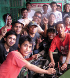 Credit: Sr. Christine Gebel) Students enrolled in an auto mechanics class as part of a program to teach livelihood skills to parolees and their children.