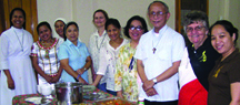 Friends gather with Archbishop Tony Ledesma, S.J., Sr. Mary Gauthier (2nd from right), and Srs. Lorie Nuñez and Christine Gebel (5th and 6th from right).