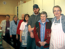 Srs. Joan Missiaen, Susan Moran, Mary Hughes, and Cecile Turner (2nd from right) join other volunteers at St. Brigid’s Out of the Cold.