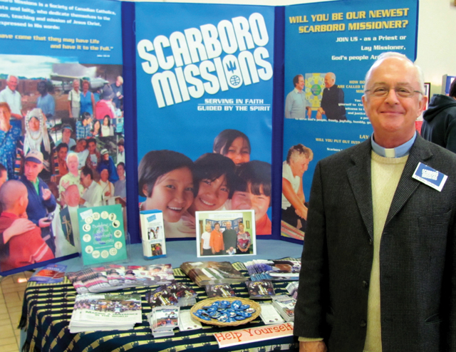 Fr. Mike at Scarboro’s booth during a Vocations Fair at Paschal Baylan Parish, Thornhill, Ontario. 2010