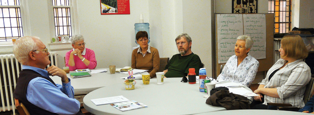 Lay candidates attend a formation class led by Fr. David Warren (left) during Scarboro’s four month lay mission preparation program.