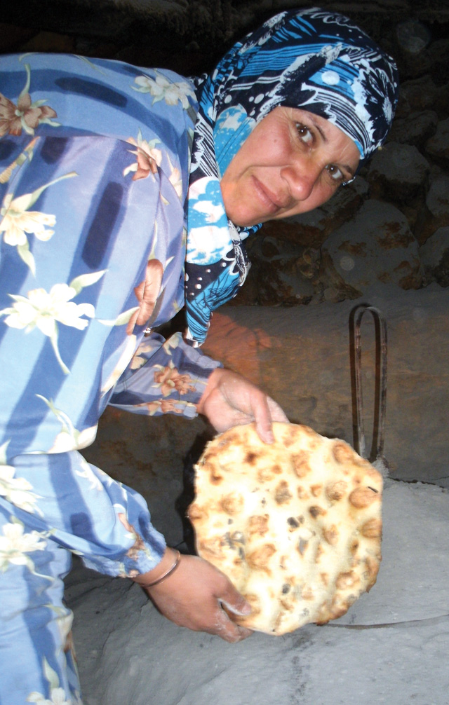 Palestinian woman making bread.