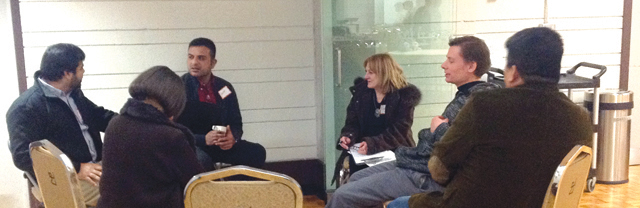 Small group discussions helped to build trust and community, and these conversations continued informally after the sessions ended (photo right).