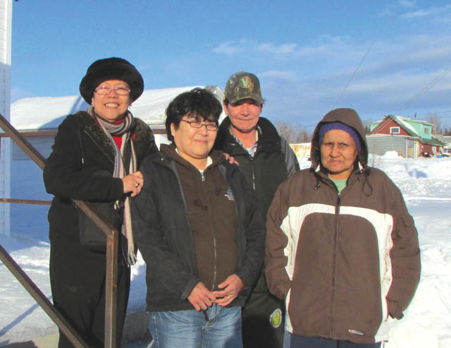 Working in Northern Manitoba, Sister Norma Samar (far left) finds warmth and friendship among First Nations people like Shirley and Gideon Cook, and Audrey.