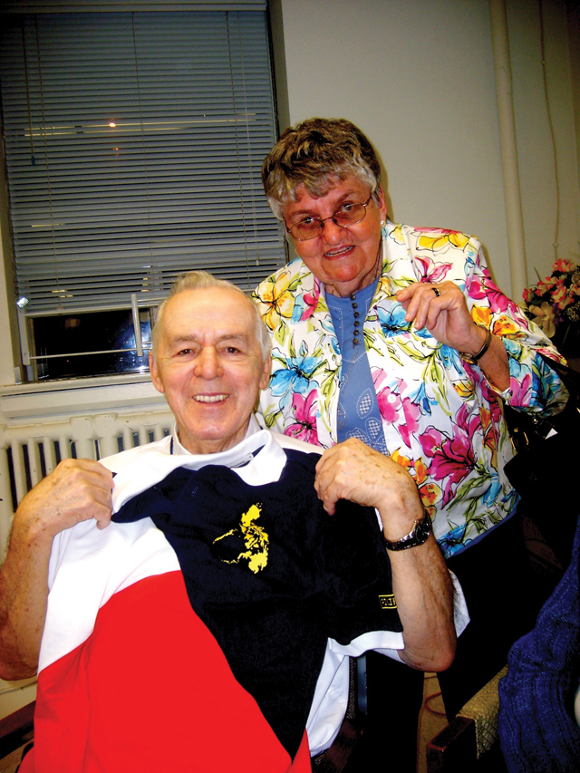 During the launch of his book, The People’s Revolution, at Scarboro’s central house on April 24, 2014, Fr. Charlie Gervais, shown here with Sister Mary Gauthier, was given a Filipino shirt by Our Lady’s Missionaries who first joined Scarboro missioners in Southern Leyte, Philippines, in 1966.