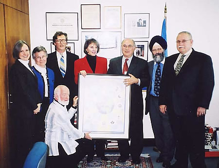 Presenting a framed Golden Rule Poster to the Secretariat of the United Nations on January 4, 2002 were leaders from the North American Interfaith Network (NAIN) and some of its member organizations and friends: Rev. Deborah Moldow from United Religions Initiative at the UN and World Peace Prayer Society; Sister Joan Kirby, Representative to the UN from Temple of Understanding; Father Terrence Gallagher, from Scarboro Missions in Toronto; Joel Beversluis, Editor of the NAIN newsletter and CoNexus Multifaith Media; Mrs. Gillian Sorensen, Assistant Secretary-General of the United Nations for External Affairs; Jonathan Granoff, from Temple of Understanding, Bawa Muhaiyadeen Fellowship, and Global Security Institute; Ralph Singh, Secretary of the NAIN Board, from Gobind Sadan-USA; and Dr. Elias Mallon, a founder of NAIN and Dean of Auburn Seminary.