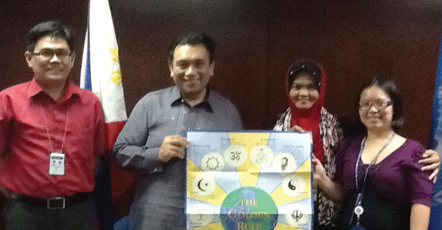 Dr. Potre Diampuan (second from right) is a Muslim educator who uses the Golden Rule Poster for interfaith and peace education work in the Philippines. Also pictured here are officials from the United Nations and other international NGOs. Dr. Potre Diampuan (second from right) is a Muslim educator who uses the Golden Rule Poster for interfaith and peace education work in the Philippines. Also pictured here are officials from the United Nations and other international NGOs.