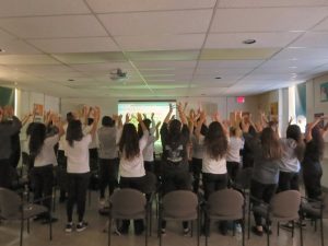Students getting a little taste of the practice of Tai Chi