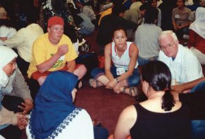 Fr. Dave Warren at a World Youth Day 2002 (Toronto) event initiated by the Toronto Muslim community and co-sponsored by Scarboro Missions Interfaith Department. The event brought together 200 Muslim and 200 Catholic youth for an evening of dialogue.
